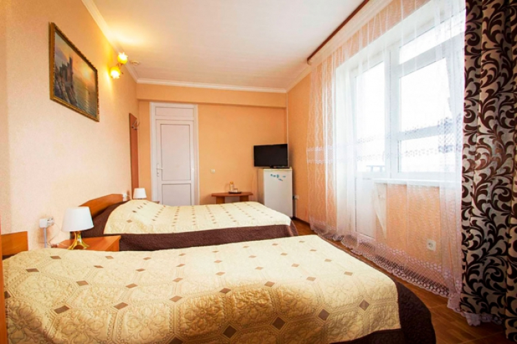 Фотография номера гостиницы Каро