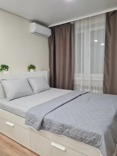 Фотография номера квартиры Апартаменты Уютные рядом с центром 3