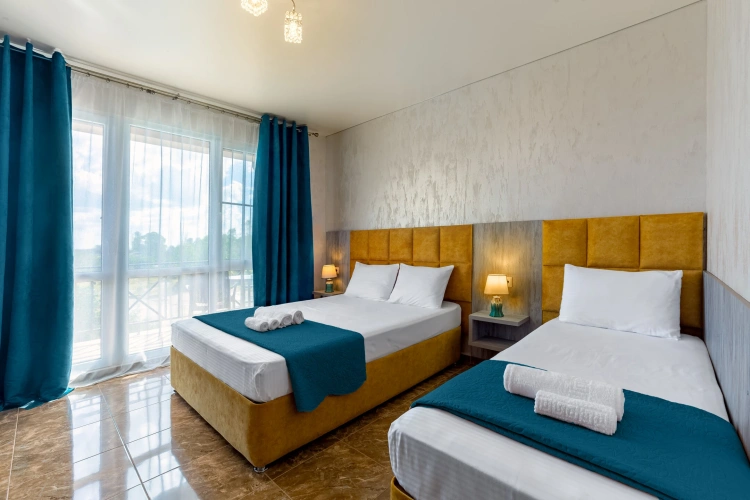Deluxe Triple room with balcony
