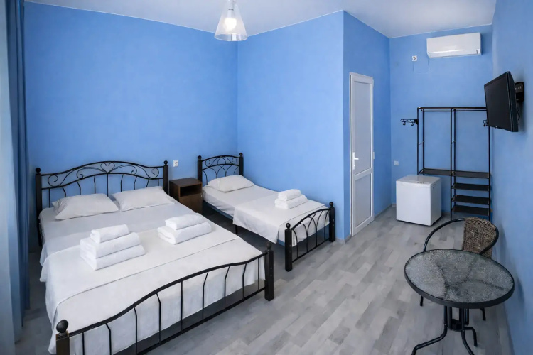 Comfort Quadruple room with courtyard view