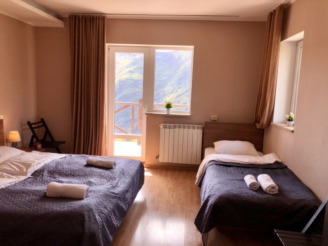Superior Triple room with balcony and with mountain view