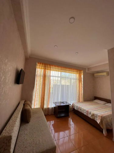 Фотография номера гостевого дома Домик на Акациях