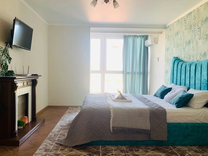 Фотография номера квартиры Апартаменты с гамаком и Камином