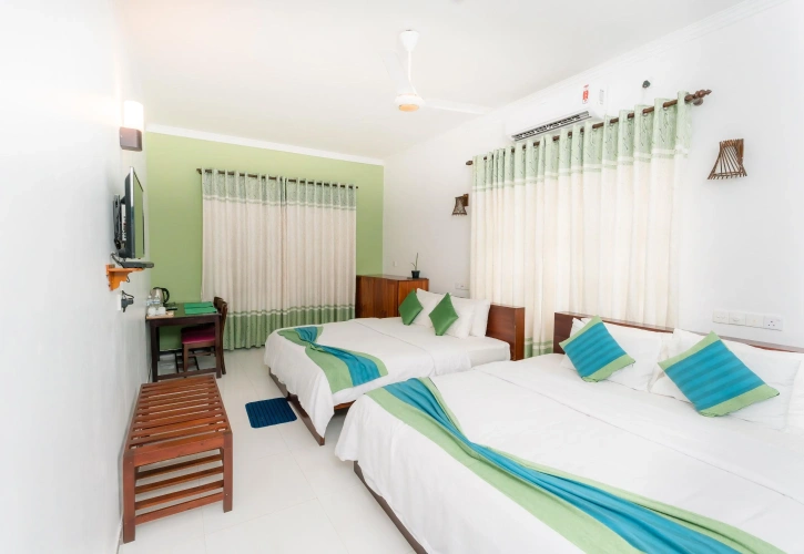 Deluxe Quadruple room with balcony and with view