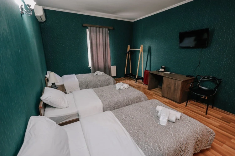 Superior Triple room with courtyard view