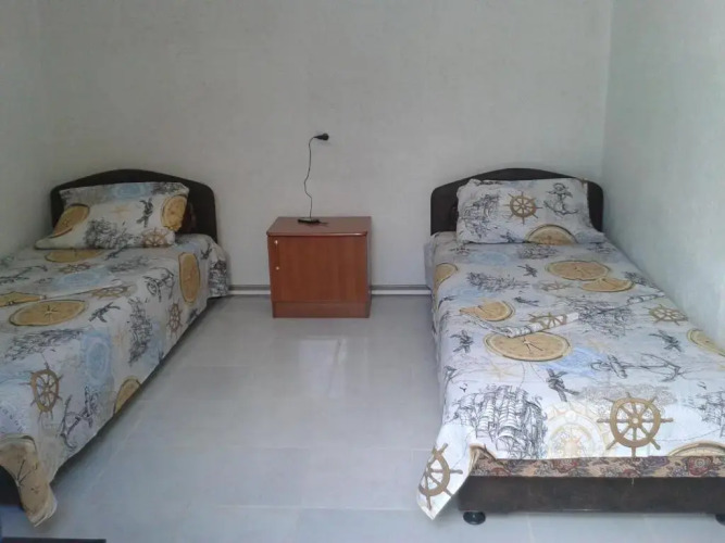 Фотография номера гостевого дома Номера у моря