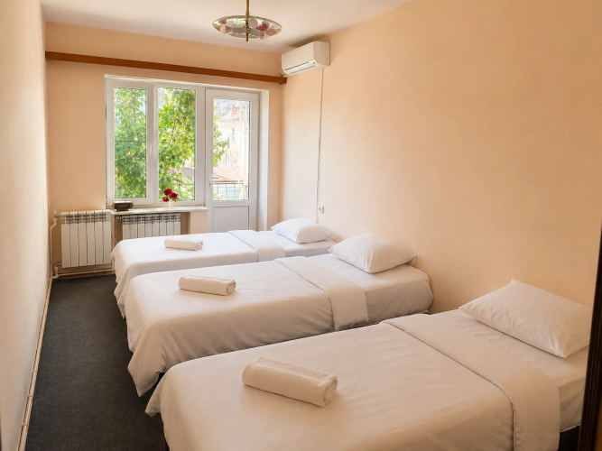 Bed in Dorm (female dorm) with balcony and with garden view
