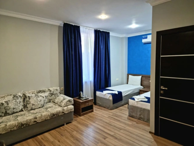 Comfort Quadruple room with view