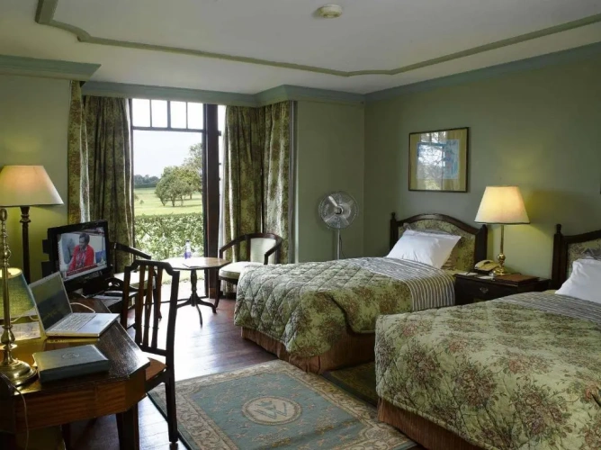 Twin Suite Studio with balcony and with garden view