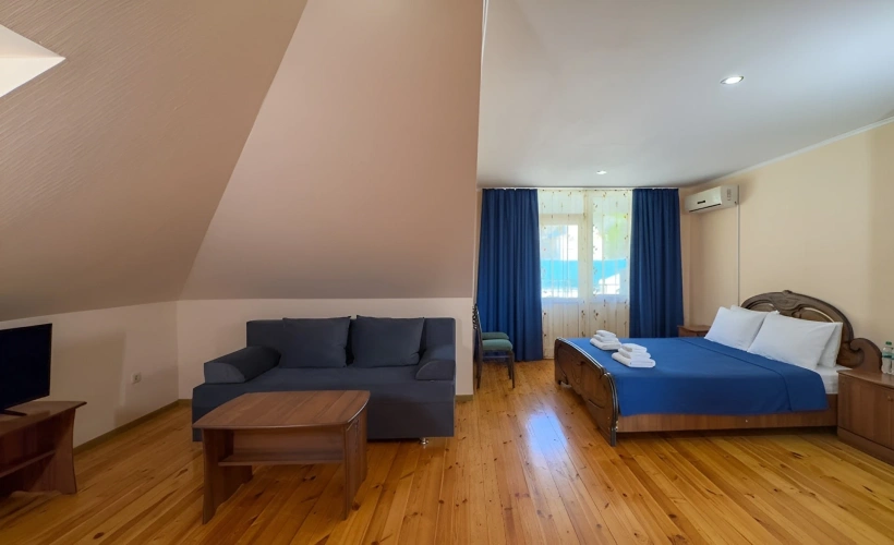Standard Double Attic room with balcony and with city view