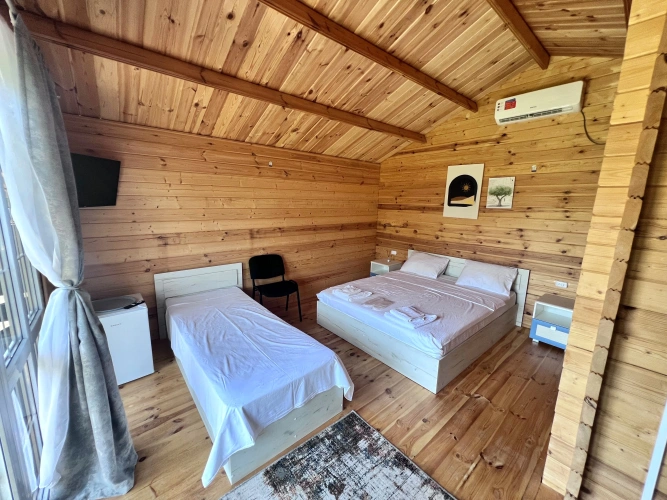 Standard Triple room with garden view