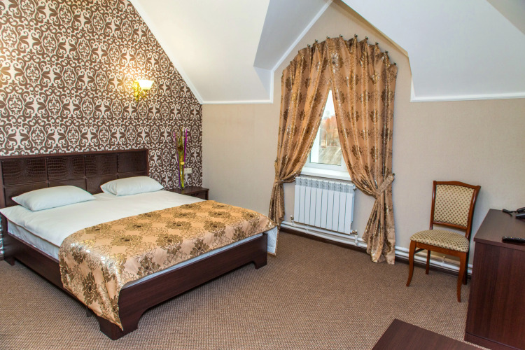 Фотография номера гостиницы Кароза