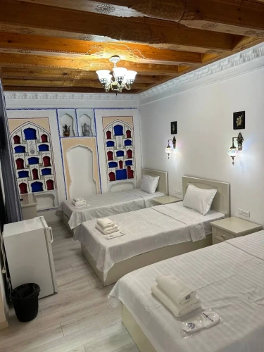 Standard Triple room with courtyard view
