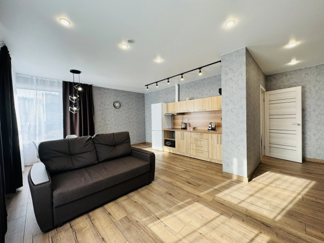 Фотография номера квартиры Апартаменты Новая просторная евротрёшка Atmosfera Sna у Набережной