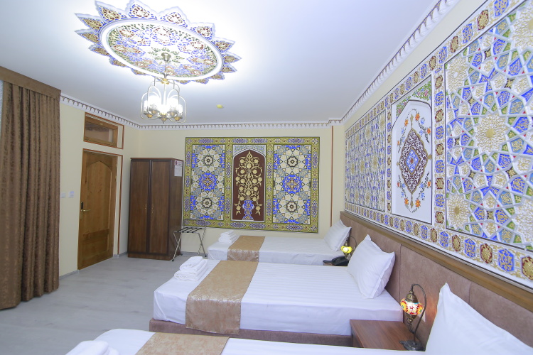 Superior Triple room with courtyard view