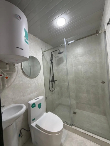 V Tsentre Goroda Apartments