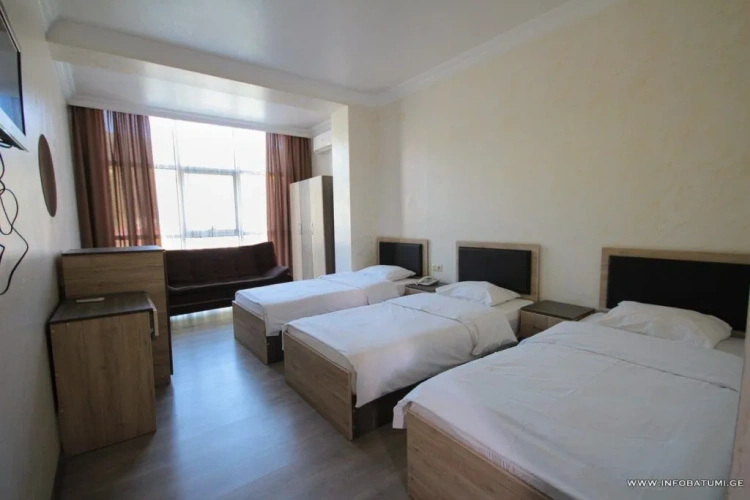 Deluxe Triple room with balcony