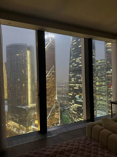 Фотография номера квартиры Апартаменты Sky City Moscow LUX Студия с большим окном с видом на все башни и город!
