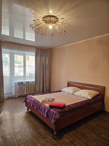 Фотография номера квартиры Квартира Уютная студия с балконом в центре города