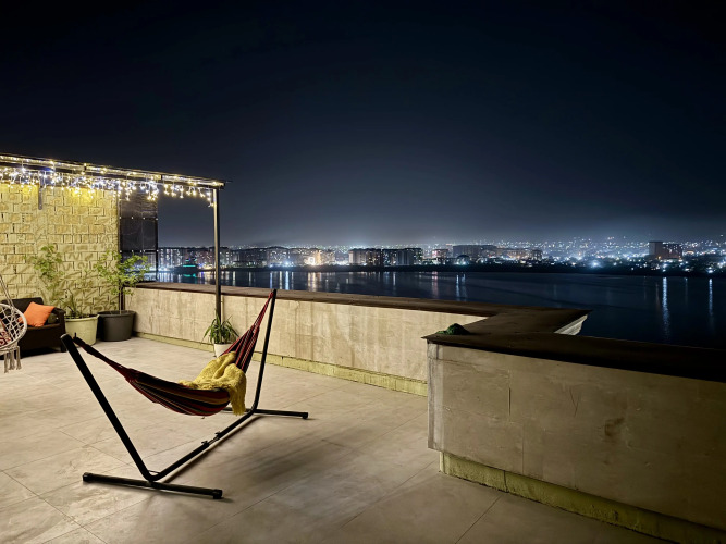 Фотография номера квартиры Квартира Пентхаус с Террасой с Видом на Море, Озеро и Горы