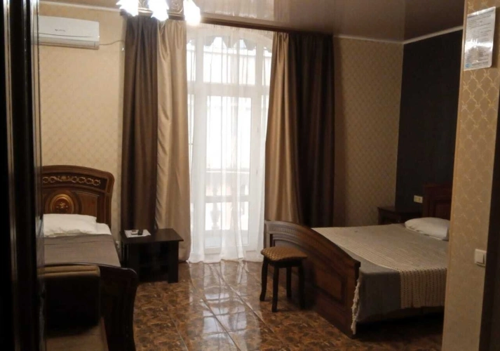 Standard Triple room with balcony and beachfront