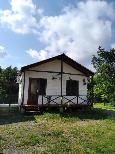 Cottage with balcony and with view