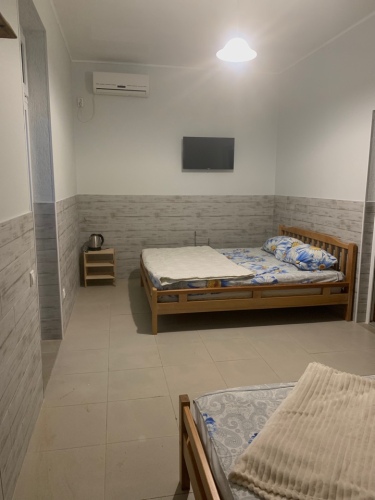 Фотография номера гостевого дома Домик у Моря