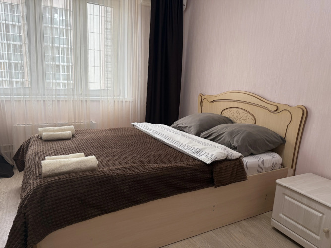 Фотография номера квартиры Квартира Здесь как Дома на Сергея Казьмина 6