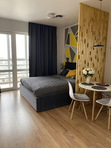 Фотография номера квартиры Апартаменты Желтая Студия с панорамным окном