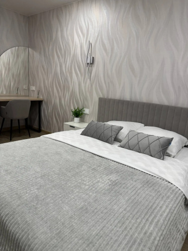 Фотография номера квартиры Квартира с дизaйнеpcким peмoнтoм и шикapным видoм нa город