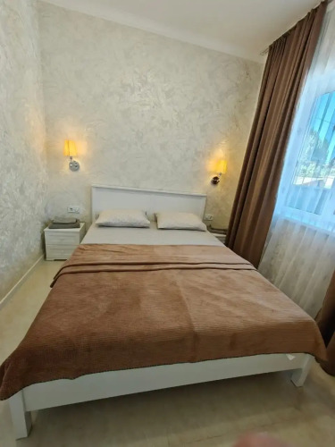 Фотография номера квартиры Апартаменты Уютные в Гостевом Домике от Best House Almaty