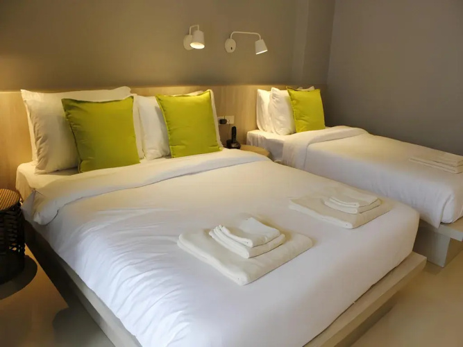 Deluxe Triple Family room with balcony and with city view