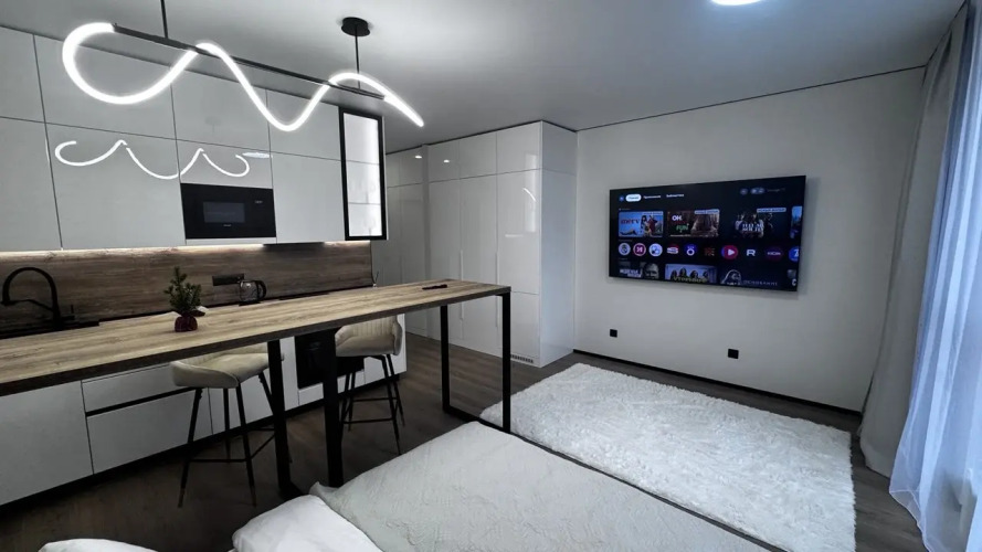 Фотография номера квартиры Апартаменты Ваш уголок спокойствия: светлая студия посуточно в спальном районе