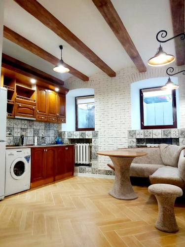 V Tsentre Goroda Apartments