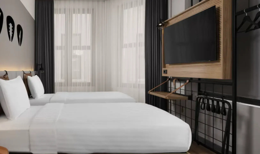 Moxy Atrium View Twin room