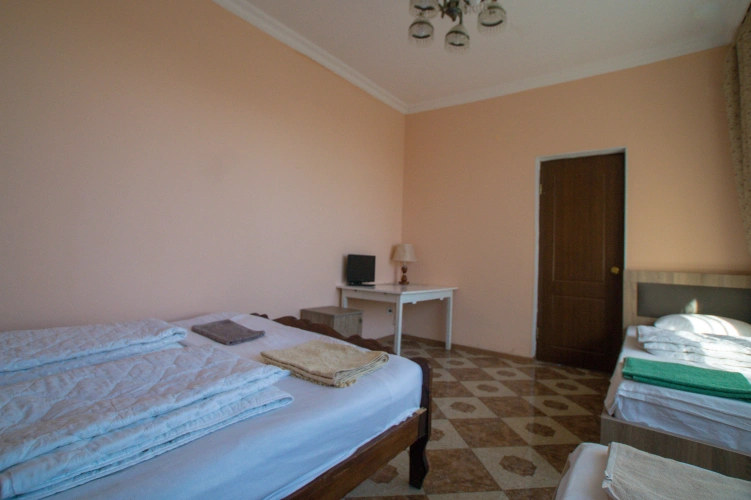 Deluxe Quadruple Family room with courtyard view