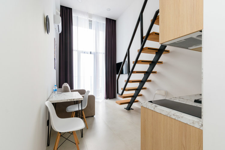 Апартаменты дуплекс с балконом и с видом на море (двуспальная кровать) - изображение 1