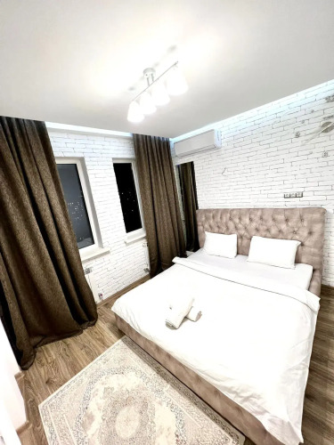 Фотография номера квартиры Апартаменты Стильная Трешка в Сердце Города