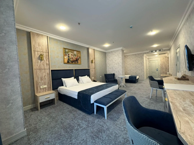 Deluxe Triple room with balcony