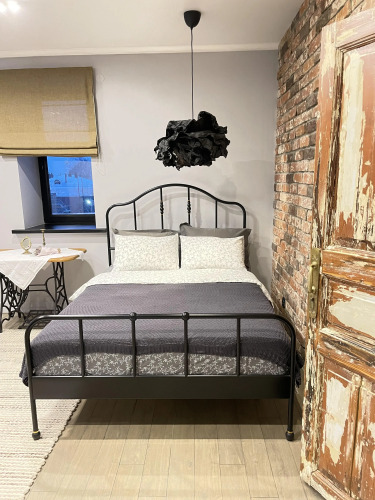 Фотография номера квартиры Апартаменты в Cтиле Лофт в Центре Города