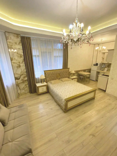 Фотография номера квартиры Апартаменты в центре города на берегу моря