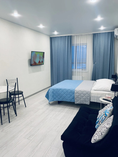 Фотография номера квартиры Квартира Уютная студия с панорамными окнами