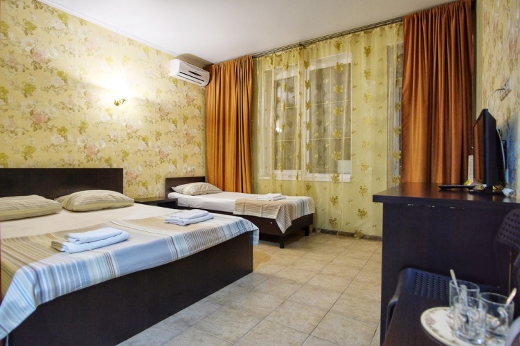 Standard Triple room with balcony and beachfront