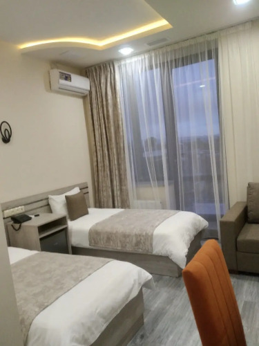 Фотография номера гостиницы Tomu's