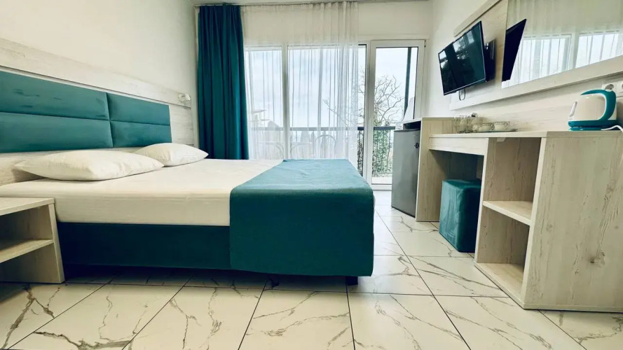 Фотография номера гостевого дома Отель-бутик Кедр