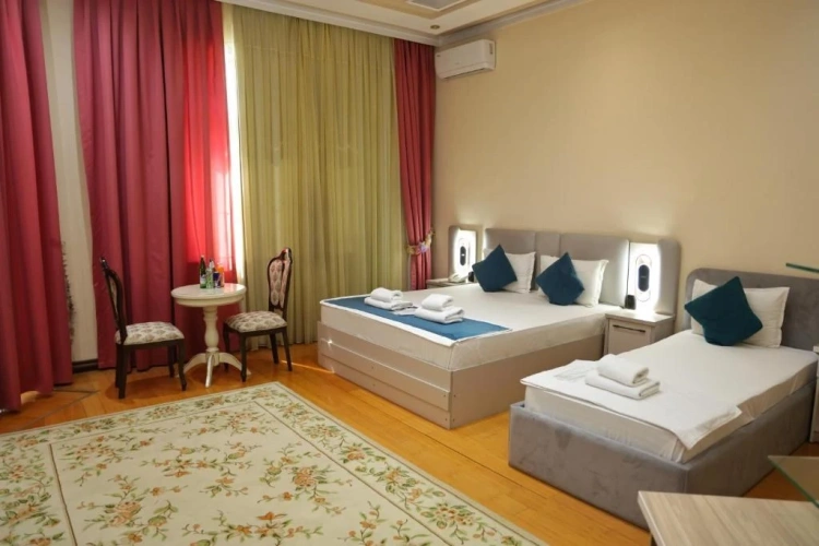 Family Suite with balcony and with courtyard view