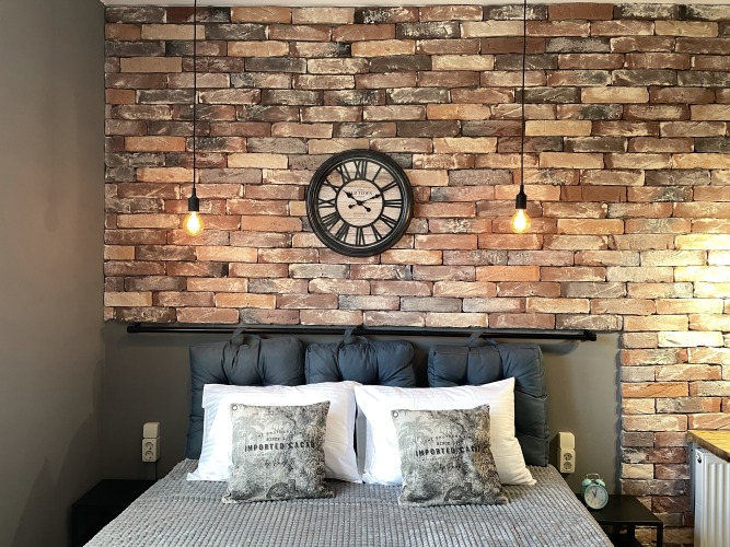 Фотография номера квартиры Апартаменты с Часами в Стиле Лофт