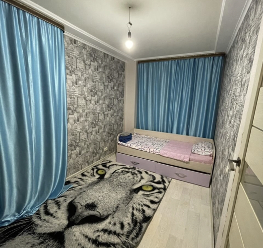 Фотография номера квартиры Квартира Уютная 2-комнатная