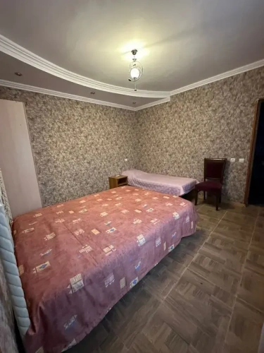 Standard Triple room with courtyard view