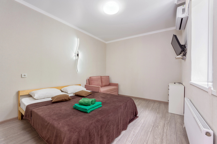 Фотография номера квартиры Апартаменты У Цветника от Rooms Apartments